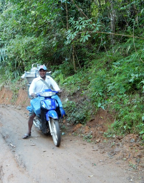 A few motorcycles passed us during our trek--although on a rainy day, we'd stick to walking.